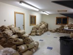 The fleece room at the CCNF Arena yesterday evening after the action. Each blanket was roughly skirted and then rolled up in brown paper for later processing and/or further skirting for show.